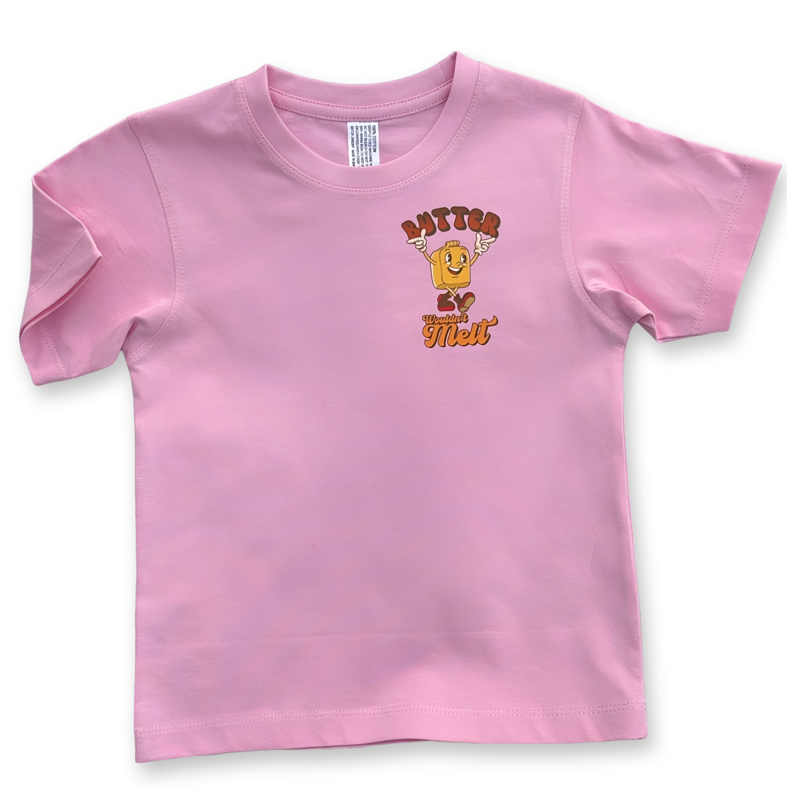 Front view of pink kids' t-shirt with small chest design of a cheerful butter character and the words "Butter Wouldn't Melt" in orange and brown hues