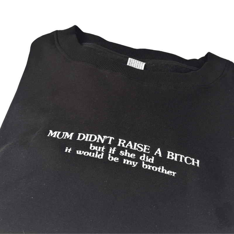 Everyday embroidered crew jumper for siblings with cheeky phrase on black fabric.