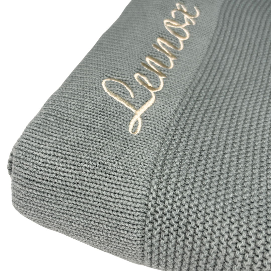 Personalised cotton baby blanket with custom name embroidery  
