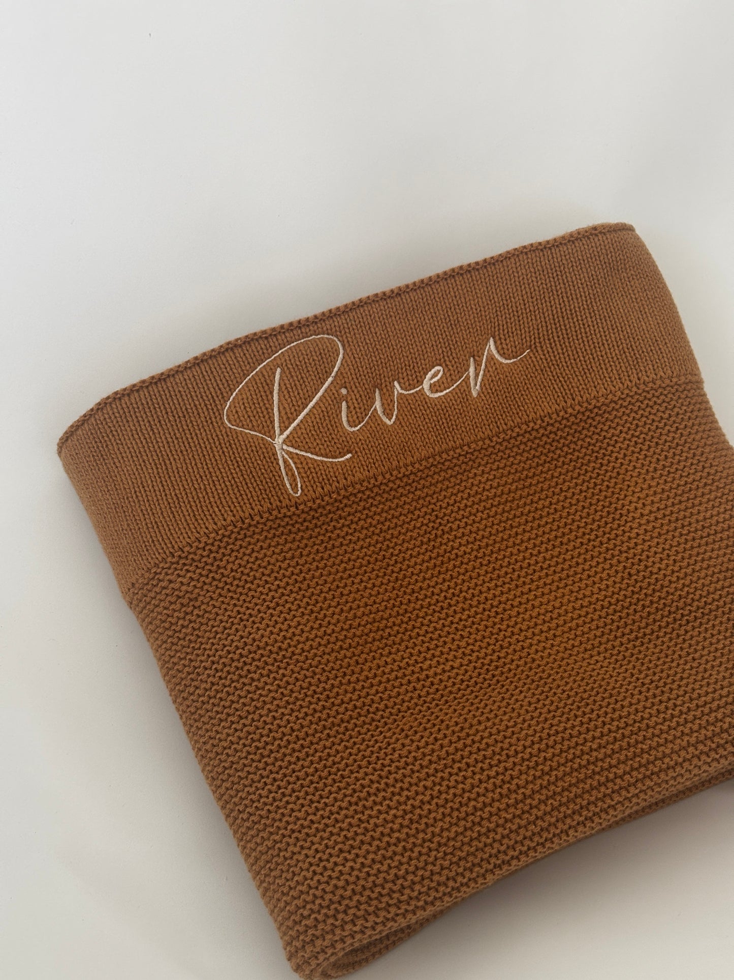 Personalised cotton baby blanket with custom name embroidery  
River in brown